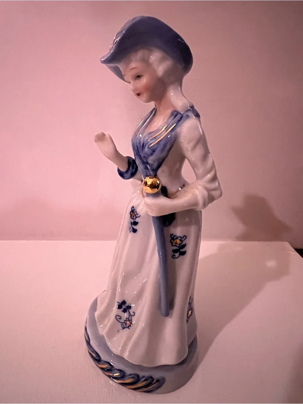 Vintage Porcelain Lady Figurine in White and Light Blue with Gold Accents